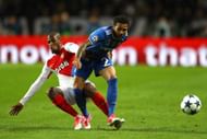 MONACO - MAY 03:  Fabinho of AS Monaco tackles Dani Alves of Juventus during the UEFA Champions League Semi Final first leg match between AS Monaco v Juventus at Stade Louis II on May 3, 2017 in Monaco, Monaco.  (Photo by Michael Steele/Getty Images)